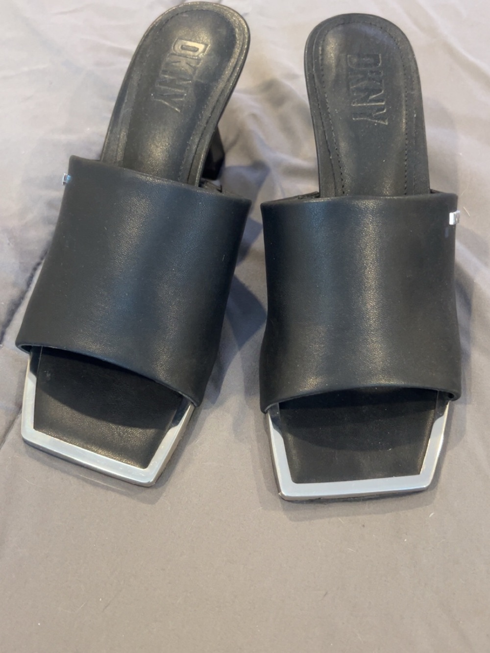 DKNY Black Slip-On Mules with Silver Accent